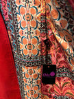 Patterned fabric with a visible brand tag labeled 'chizO' on a red background.